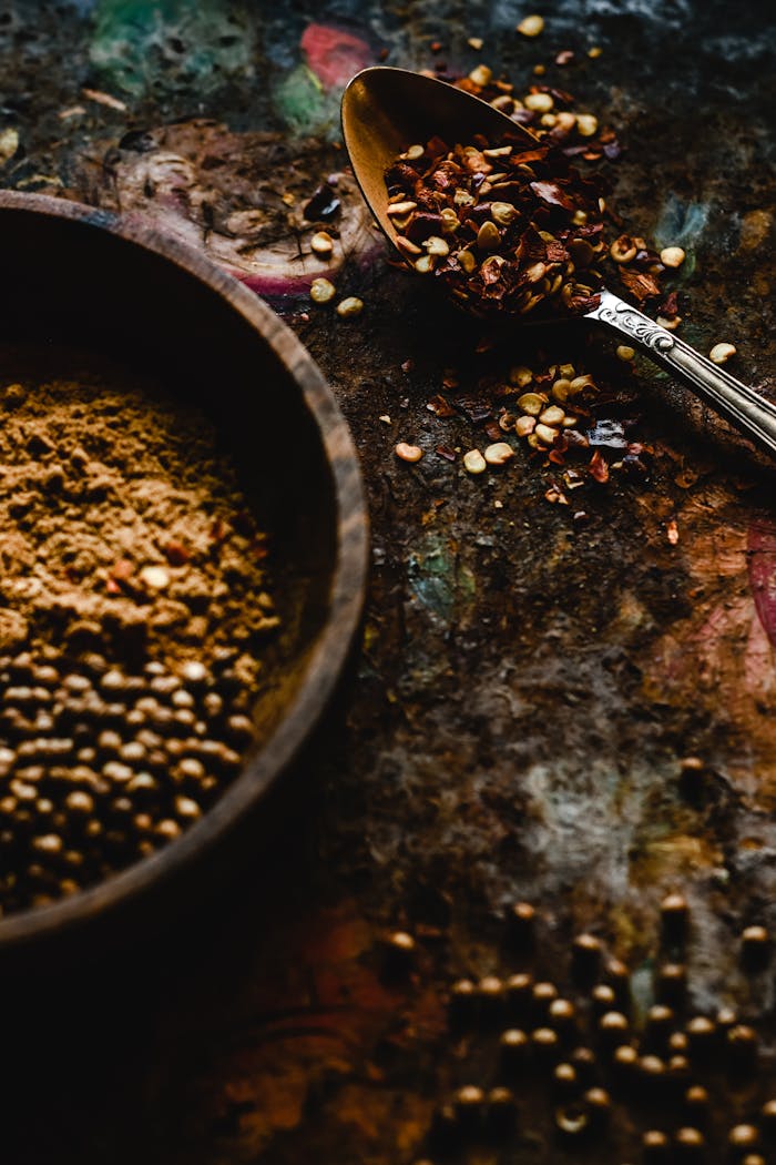 Spices in Bowl and on Spoon